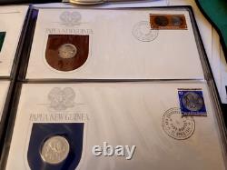 1975 Papua New Guinea Stamp Cover & Proof Coin set 8 covers & Coins Front & Back