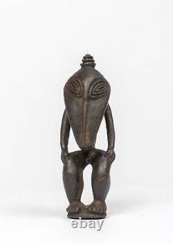 A Sepik Figural Amulet/Ancestor Figure, Papua New Guinea