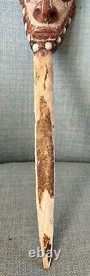 A papua New Guinea Sepik Cassowary bone payback Daggar with clay head 37cm
