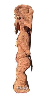 Antique Carved Papua New Guinea Cowrie Eyed Chief Wearing A Lizard Head Dress