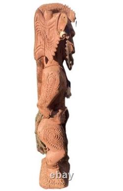 Antique Carved Papua New Guinea Cowrie Eyed Chief Wearing A Lizard Head Dress