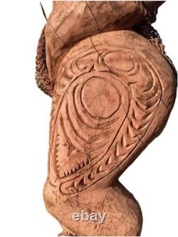 Antique Carved Papua New Guinea Cowrie Eyed Chief Wearing A Lizard Head Dress