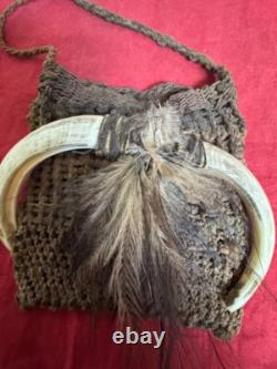 Antique Oceanic Papua New Guinea wild Boar Tusks Woven Medicine Bag