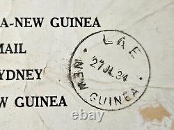 Australia 1934 FFC Round Trip Cover t Lae Papua New Guinea + Rare Mail Bag Label