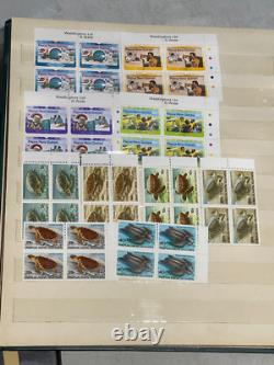 CMMY23 Papua New Guinea 1961 1986 mostly mint unhinged in blocks of 4