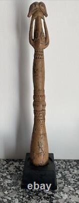 Carved wooden pestle, Asmat culture. Papua New Guinea, Ex Brant Mackley Gallery