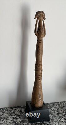 Carved wooden pestle, Asmat culture. Papua New Guinea, Ex Brant Mackley Gallery