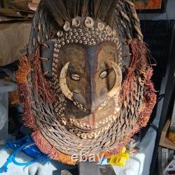 Early Papau New Guinea Mask On Stand Profusely Decorated, On Stand