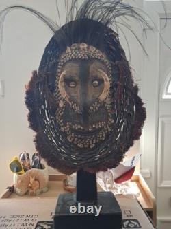 Early Papau New Guinea Mask On Stand Profusely Decorated, On Stand