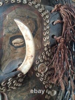 Early Papau New Guinea Mask On Stand Profusely Decorated, On Stand