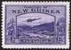 NEW GUINEA-1935 £2 Bright Violet Air Stamp. An unmounted mint Sg 204 toning