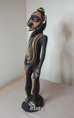 OLD PAPUA NEW GUINEA CARVED AND PAINTED WOOD STATUE OF A MAN SHELL EYES 37cm