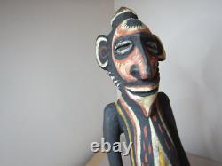 OLD PAPUA NEW GUINEA CARVED AND PAINTED WOOD STATUE OF A MAN SHELL EYES 37cm