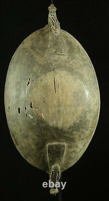 Old Lower Sepik traditional food dish with spirit faces Papua New Guinea