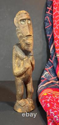 Old Papua New Guinea Carved Wooden Figure with Cowrie Shell Eyes
