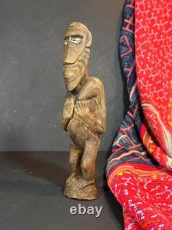 Old Papua New Guinea Carved Wooden Figure with Cowrie Shell Eyes