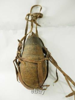 Old Papua New Guinea Hemp Woven Water Canteen with cowrie shells, Pitch, & Leather