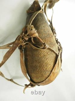 Old Papua New Guinea Hemp Woven Water Canteen with cowrie shells, Pitch, & Leather