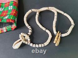 Old Papua New Guinea Highlands Kina Shell Necklace with Dog Fangs. Beautiful col