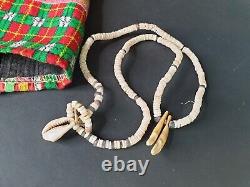 Old Papua New Guinea Highlands Kina Shell Necklace with Dog Fangs. Beautiful col