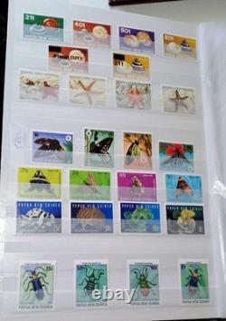 PAPUA NEW GUINEA MNH stamp collection mainly reptiles, butterflies, shells, etc