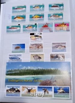 PAPUA NEW GUINEA MNH stamp collection mainly reptiles, butterflies, shells, etc