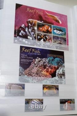 PAPUA NEW GUINEA MNH stamp collection mainly reptiles, butterflies, shells, etc