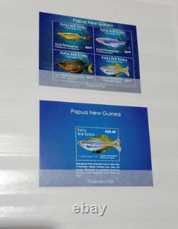 PAPUA NEW GUINEA MNH stamp collection mainly reptiles, butterflies, shells, etc