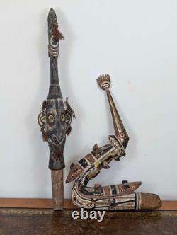 Pair Papua New Guinea canoe prow carvings in pigment-painted hardwood mid-20th c