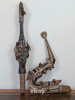 Pair Papua New Guinea canoe prow carvings in pigment-painted hardwood mid-20th c
