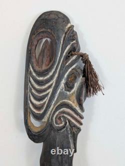 Pair Papua New Guinea canoe prow carvings in pigment-painted hardwood mid-20th c