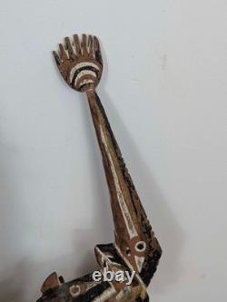 Pair Papua New Guinea canoe prow carvings in pigment-painted hardwood mid-20th c