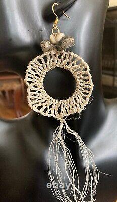 Papua New Guinea Bilum and Tolai tabu shell money earrings. Sacred currency