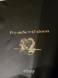 Papua New Guinea Coin and Stamp Sets. (AFIT 555)