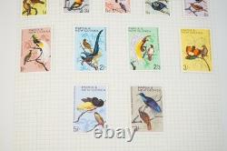 Papua New Guinea Collection Of 875+ Mint Stamps Stored In Stanley Gibbons Album