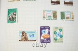 Papua New Guinea Collection Of 875+ Mint Stamps Stored In Stanley Gibbons Album