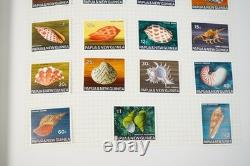 Papua New Guinea Collection Of 875+ Mint Stamps Stored In Stanley Gibbons Album