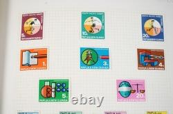 Papua New Guinea Collection Of 875+ Mint Stamps Stored In Stanley Gibbons Album