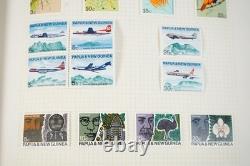 Papua New Guinea Collection Of 875+ Mint Stamps Stored In Stanley Gibbons Album