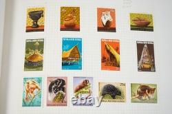 Papua New Guinea Collection Of 875+ Mint Stamps Stored In Stanley Gibbons Album