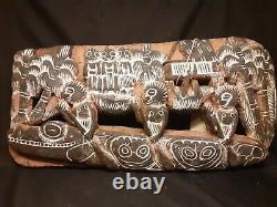 Papua New Guinea Story Board. Kambot Village, crocodile canoe & spirit house