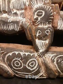 Papua New Guinea Story Board. Kambot Village, crocodile canoe & spirit house