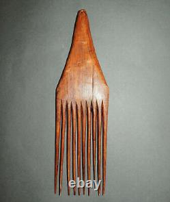 Papua New Guinea comb, wood, carved face
