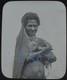 Photograph UNANA WOMAN WITH PIG PAPUA NEW GUINEA DATED 1906 Magic Lantern Slide