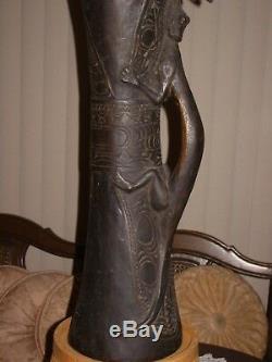 Primitive art Sepik river Papua New Guinea kundu dance drum climbing crocodile