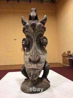 Sculpture of a Masked Man From Tribes of Sepik River Papua New Guinea (must see)