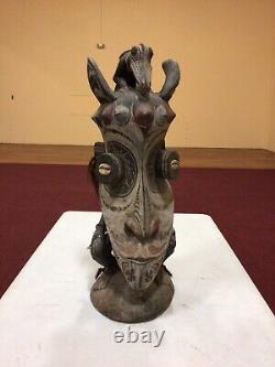Sculpture of a Masked Man From Tribes of Sepik River Papua New Guinea (must see)