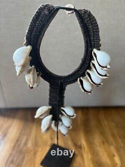 Vintage Papua New Guinea fertility shell necklaces (male and female)