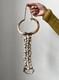 West Papua, Asmat people, wild boar tusk breast ornament, New Guinea