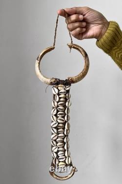 West Papua, Asmat people, wild boar tusk breast ornament, New Guinea
